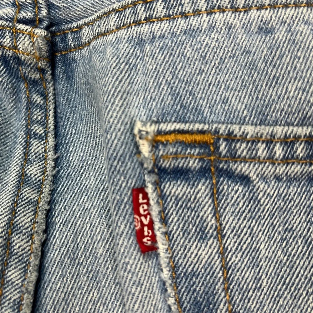 Levis 550 Jeans Mens 34x30 Light Wash Blue Straight Leg 5 Pocket Distressed FLAW